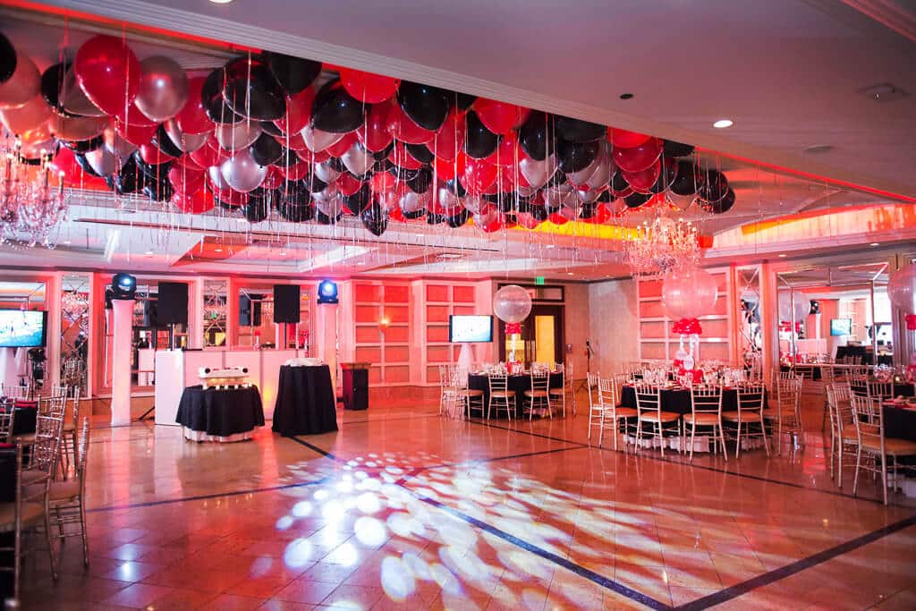 Red, Black and Silver Ceiling Balloons with Shimmer Ribbon over Dance Floor at Seasons Catering