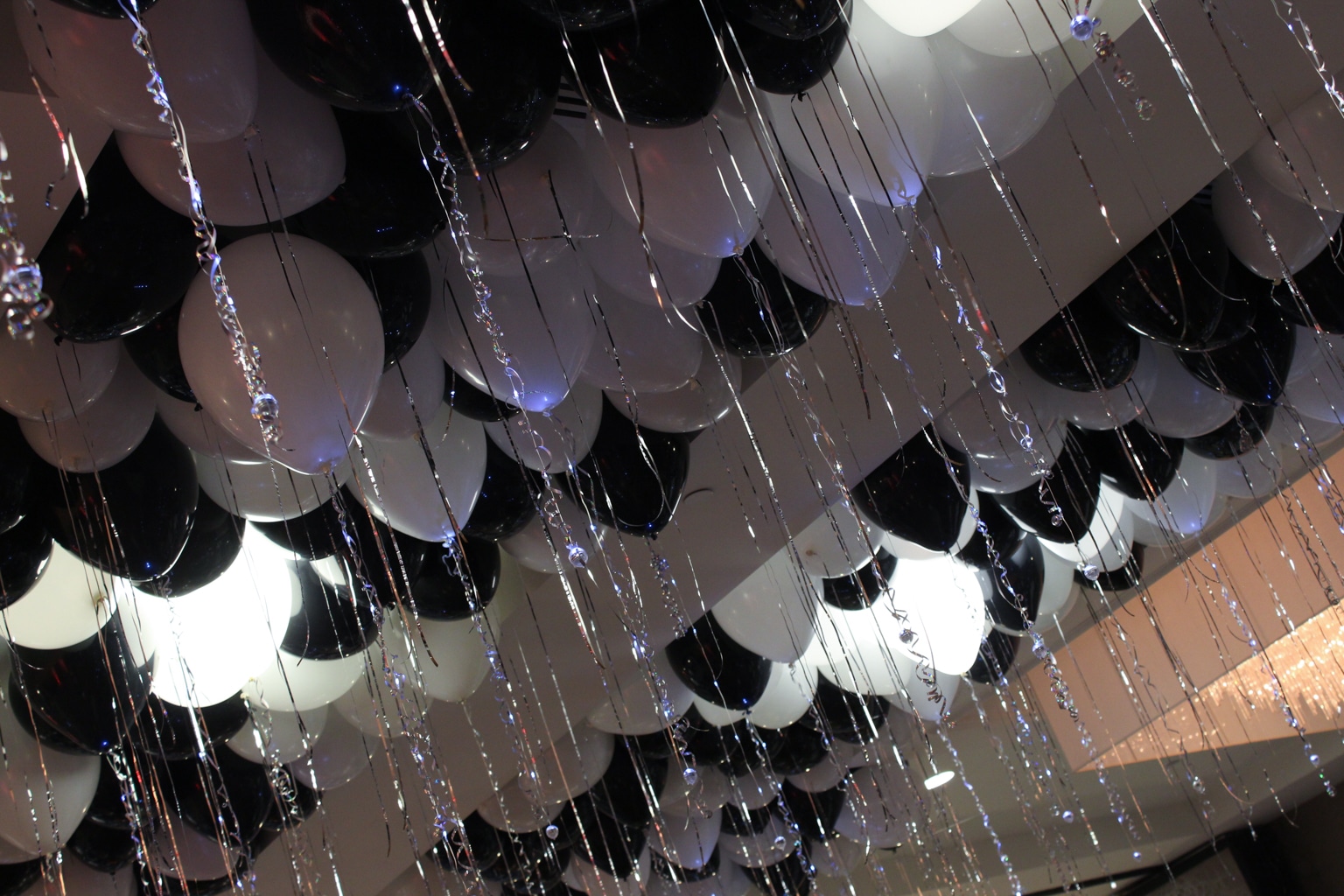 Black and White Ceiling Balloons with Silver Shimmer Ribbon and LED Sparkle Ribbon
