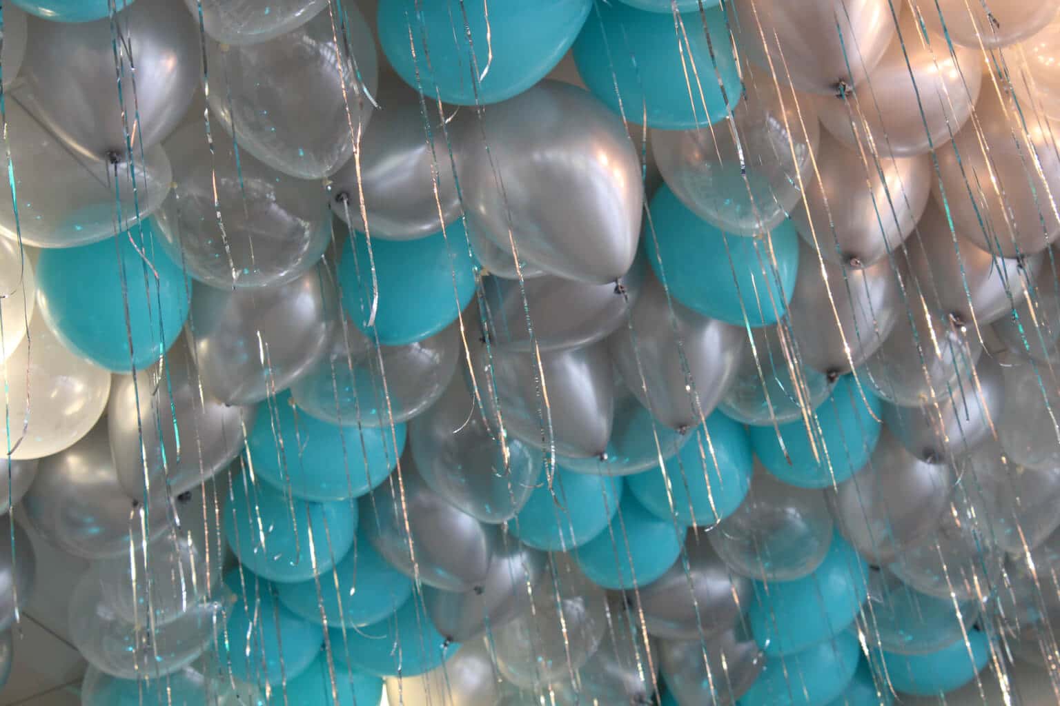Turquoise and Silver Ceiling Balloons with Shimmer Ribbon over Dance Floor at Indian Trails Club