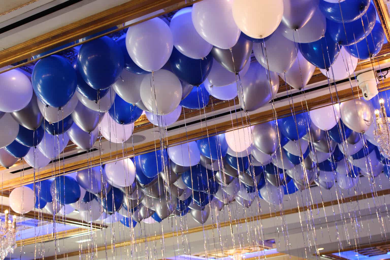 Blue and White Ceiling Balloons with Shimmer Ribbon over Dance Floor