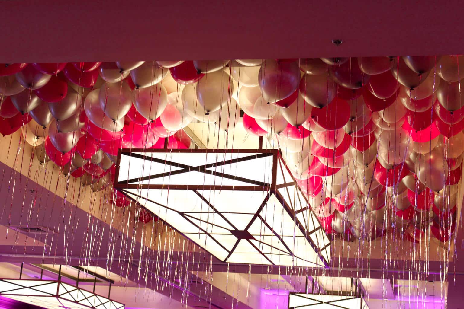 Hot Pink and Silver Ceiling Balloons with Shimmer Ribbon at the Trumbull Marriott