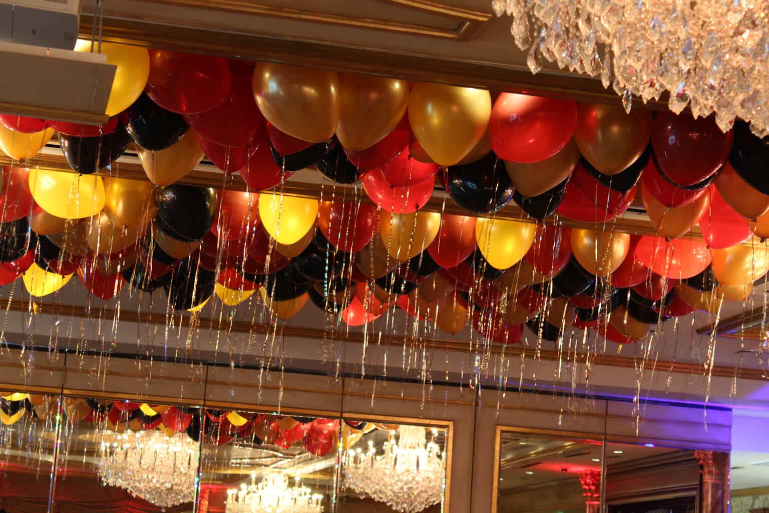 Red, Black and Gold Ceiling Balloons with Shimmer Ribbon on Ceiling at Seasons