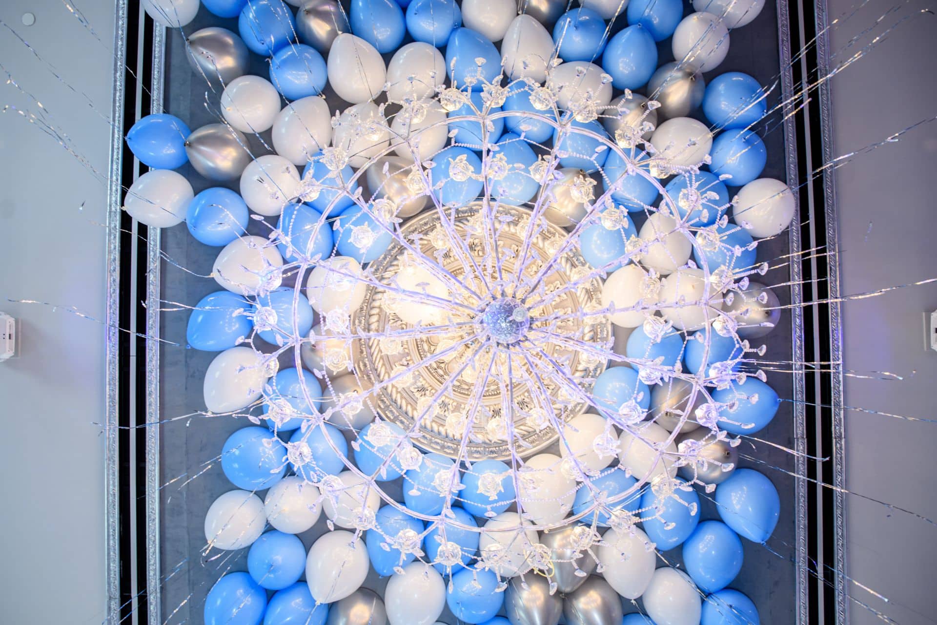 Pale Blue, White and Silver Ceiling Balloons with Shimmer Ribbon over Dance Floor at Meadowood Manor
