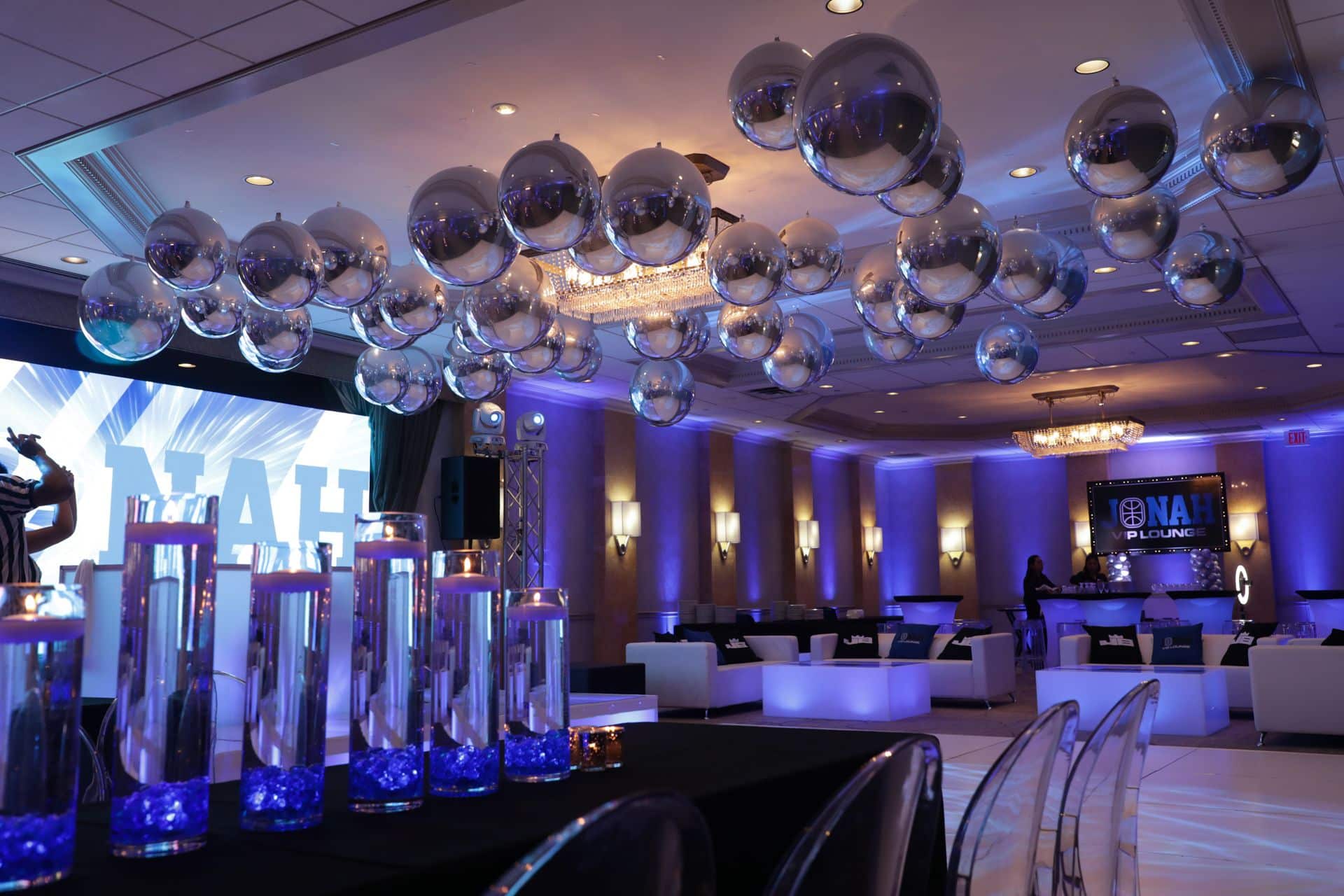 Silver Metallic Orbz Balloons over Dance Floor with Custom LED Lounge and Blue Uplighting at the Hilton, Woodcliff Lake