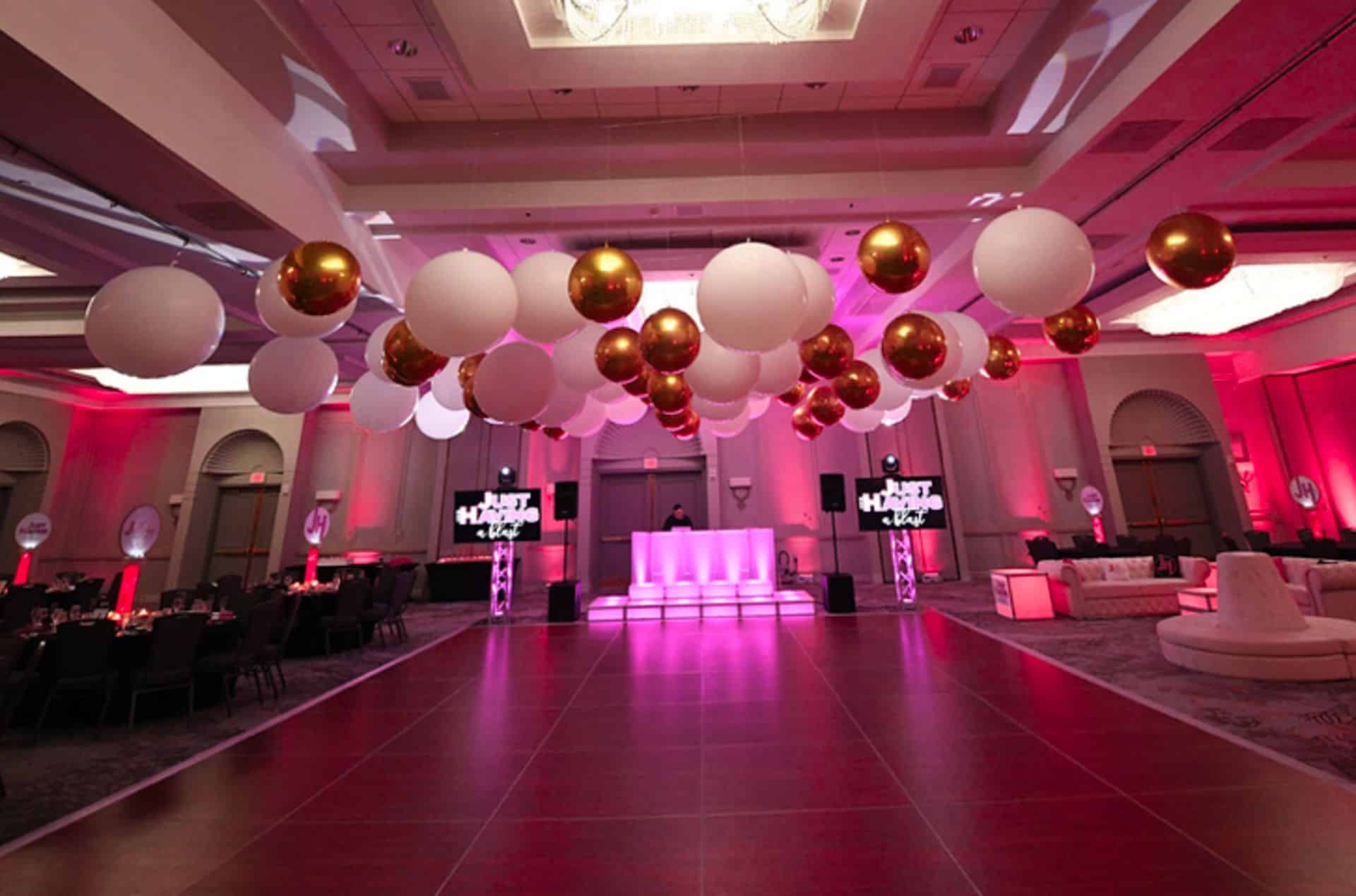 White and Gold Ceiling Balloons over Dance Floor at Park Ridge Marriott
