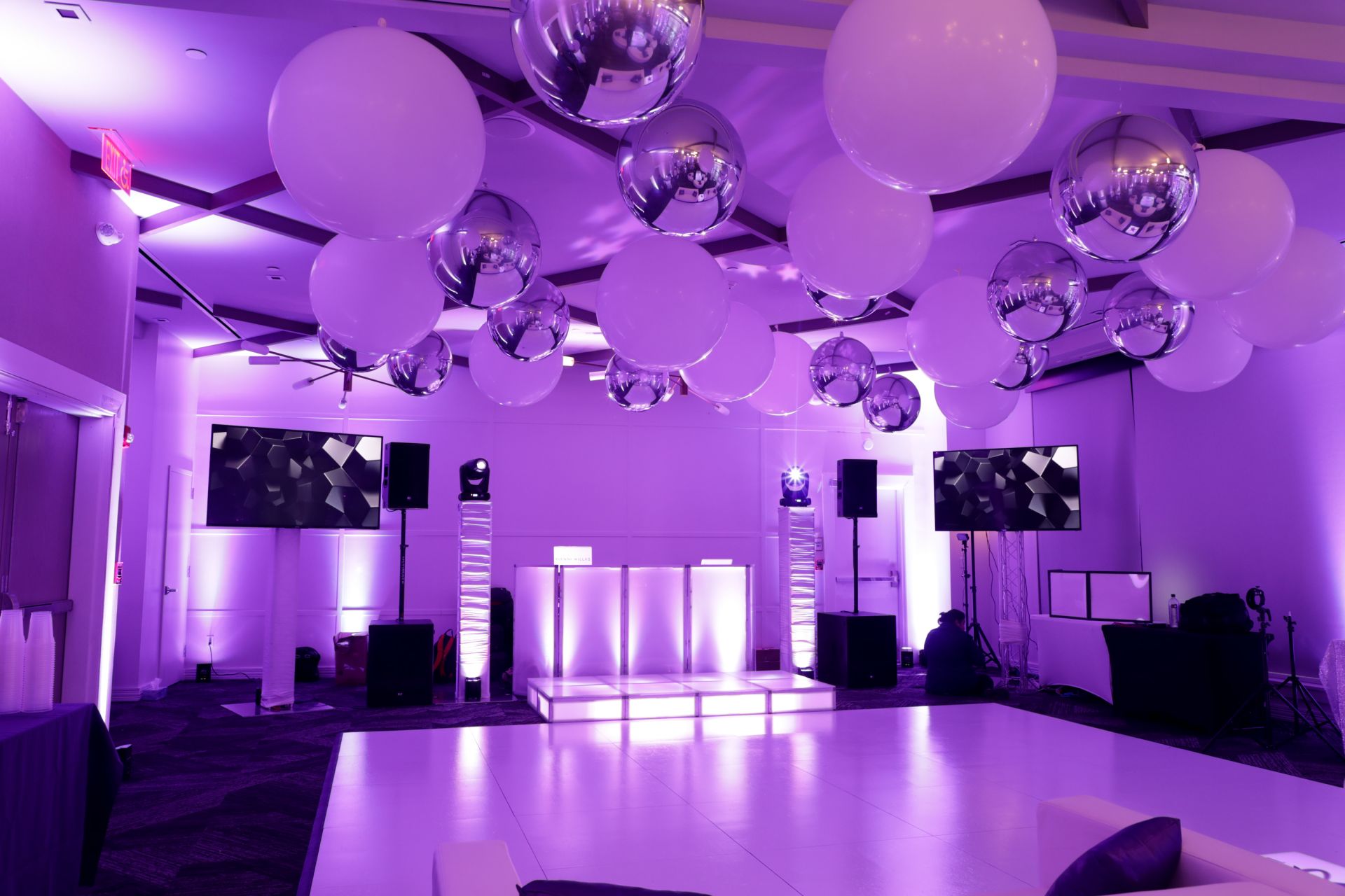 White 3' Balloons and Silver Metallic Orbz Ceiling Treatment Over Dance Floor and Lavender Up Lighting Around Room as Decor Accent for Bat Mitzvah