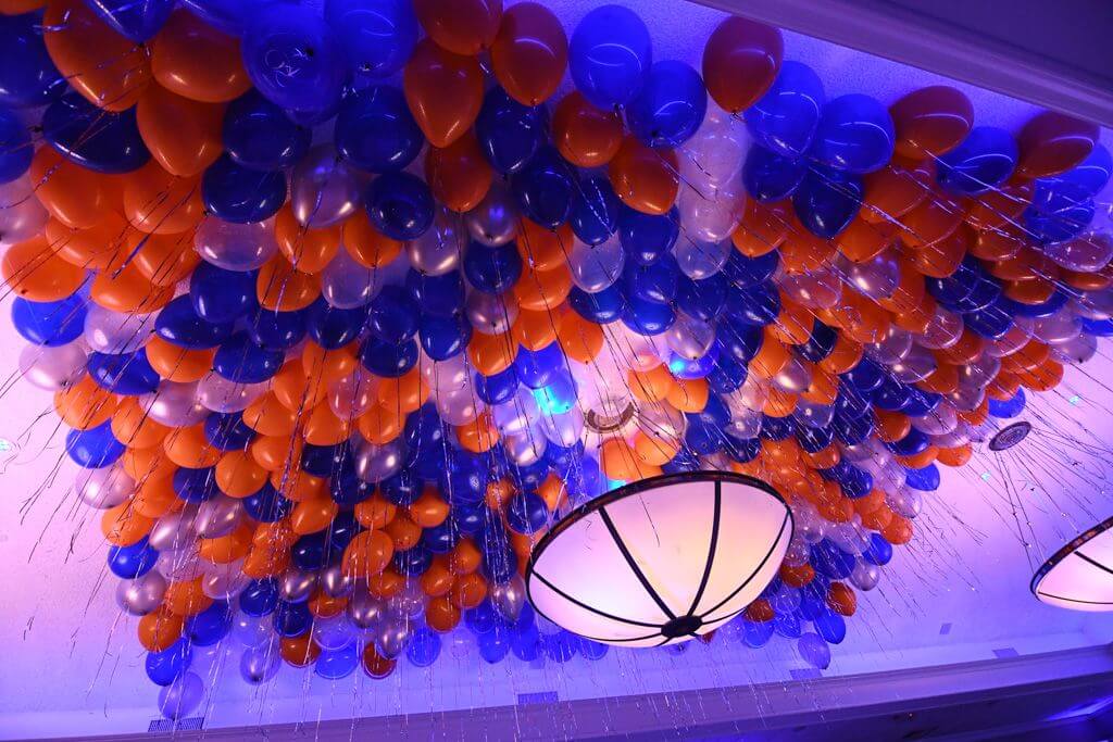 Orange and Blue Ceiling Balloons over Dance Floor at Cedar Hill Country Club