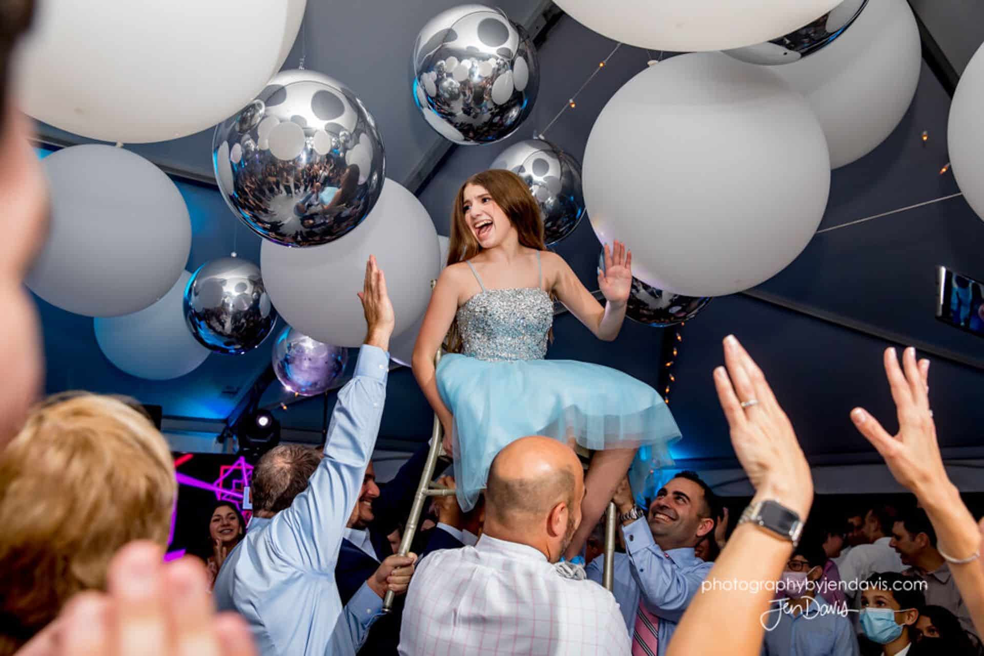White and Silver Ceiling Balloons in Tent for Outdoor Bat Mitzvah