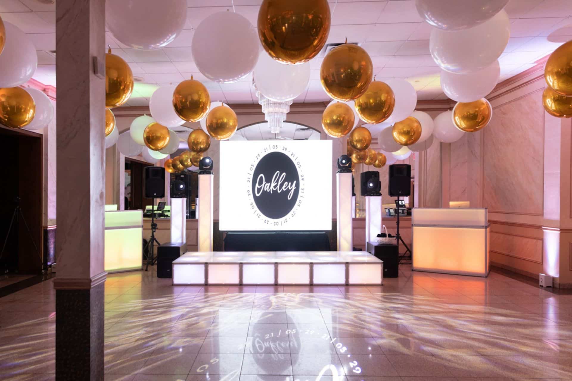 Large White Balloons and Gold Orbz Ceiling Treatment Over Dance Floor for Indoor Bat Mitzvah