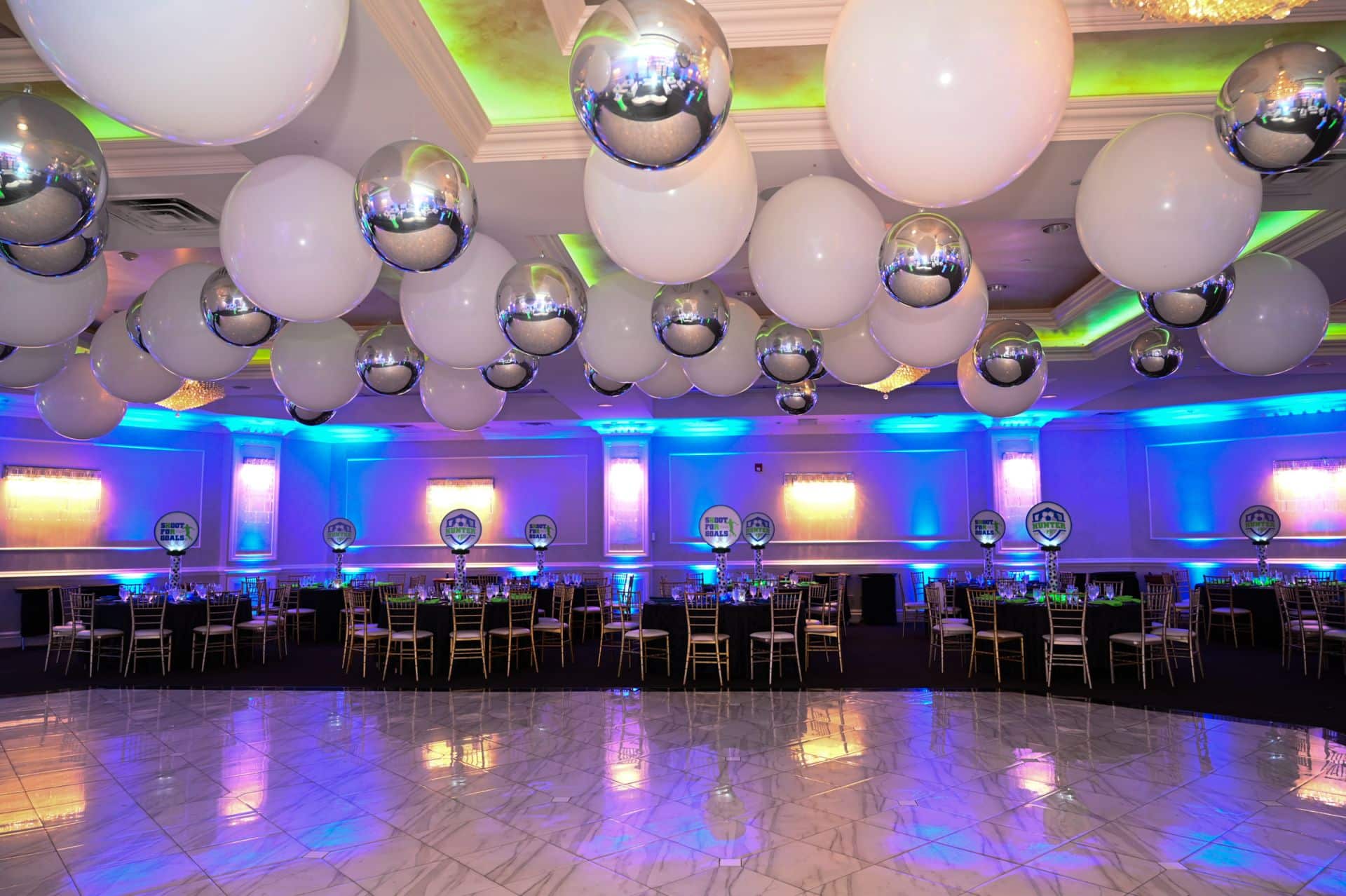 Ceiling Balloons Install with Silver and White Orbz at Wilshire Grand