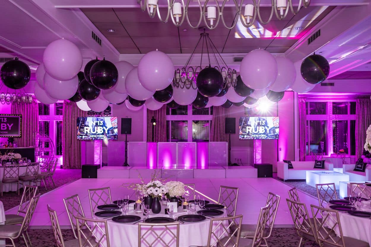 Black Metallic Orbs & White Latex Balloon Ceiling Over The Dance Floor At Harrison Meadows Country Club for a Chanel Themed Bat Mitzvah