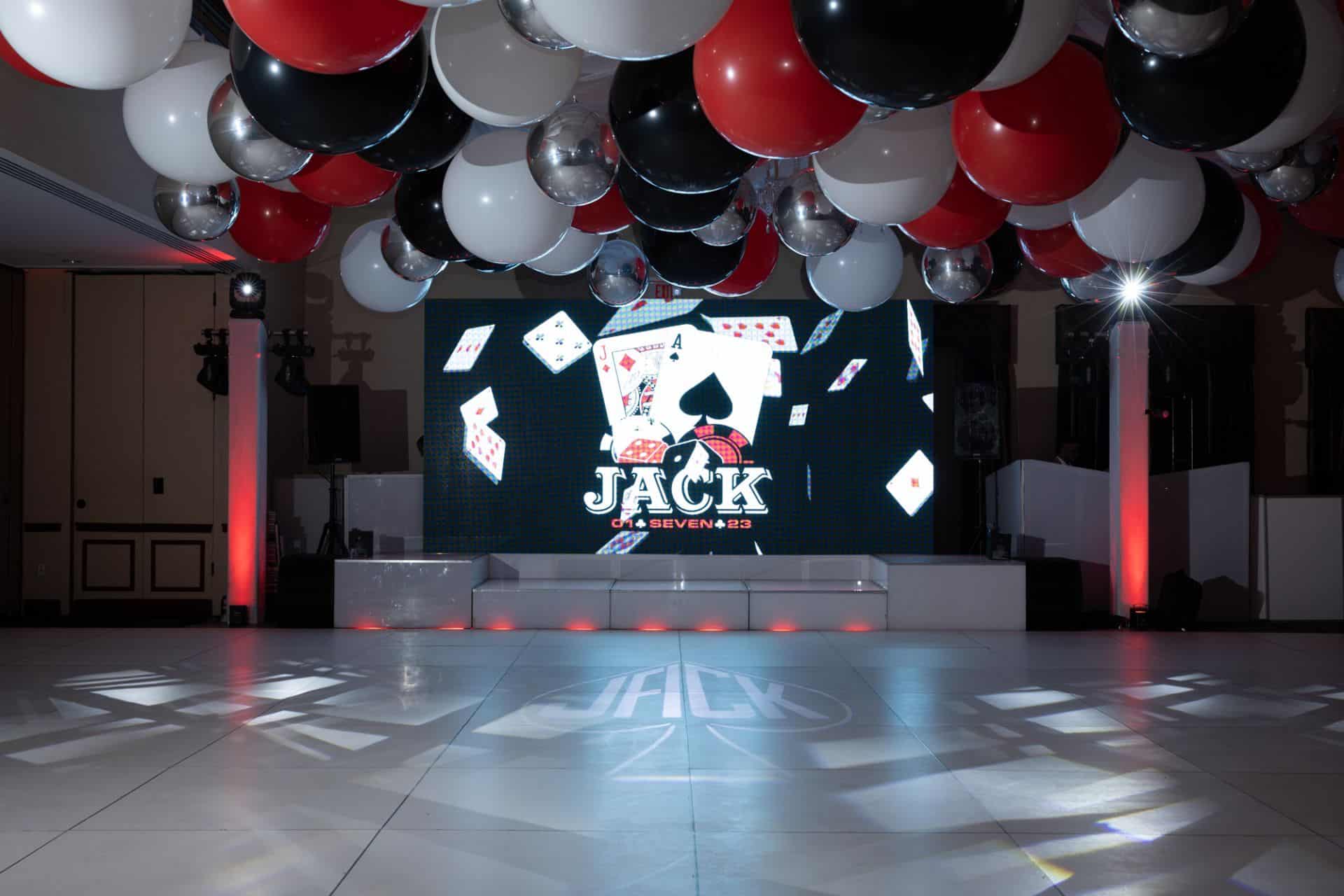 Red, Black and White Ceiling Balloon Treatment over Dance Floor for Casino Themed Bar Mitzvah at Temple Emanu-el, Closter