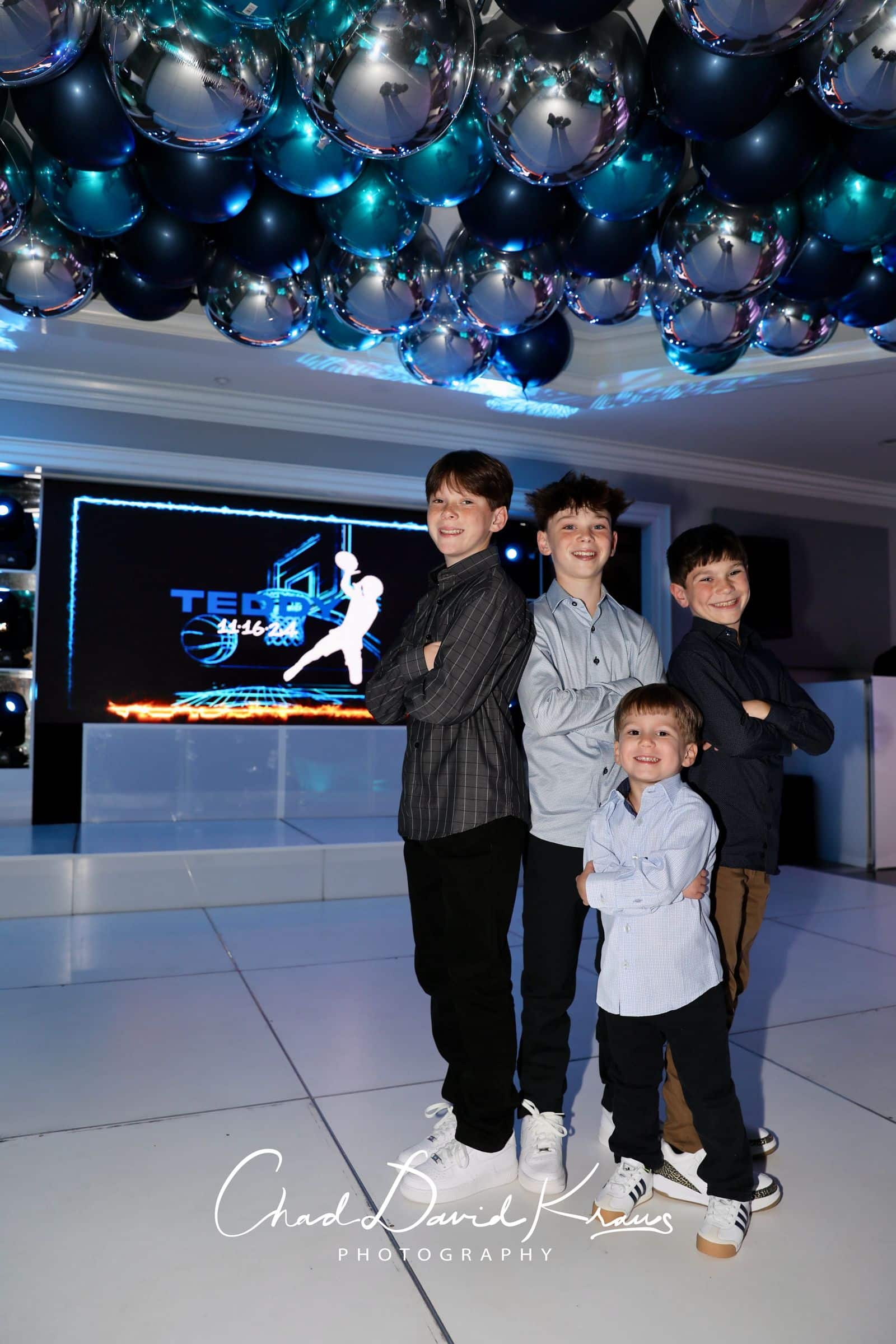 Metallic Ceiling Orbs Over Dance Floor