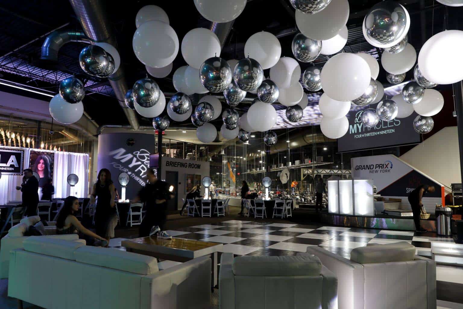 White and Silver Ceiling Balloon Treatment over Dance Floor at Grand Prix, Mt. Cisco