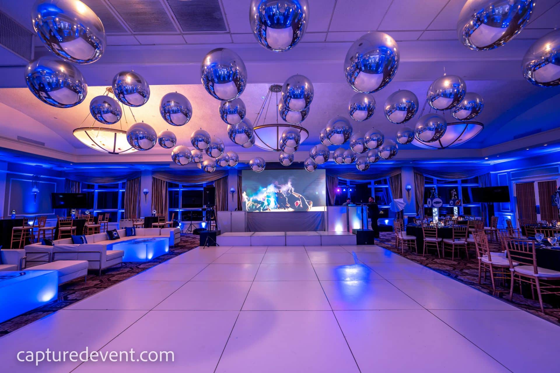 Silver Metallic Orbz Balloon Install over Dance Floor at Cedar Hill, CC