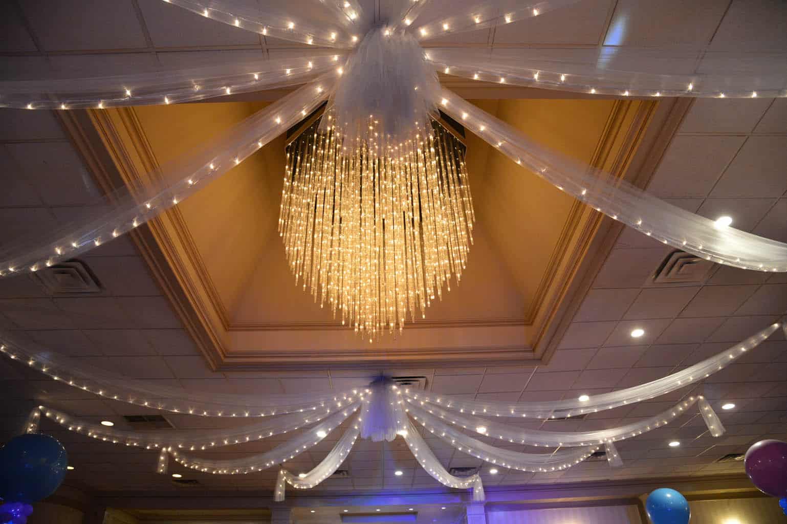 Silver Tulle Swagged over Dance Floor with Lights at Town and Country