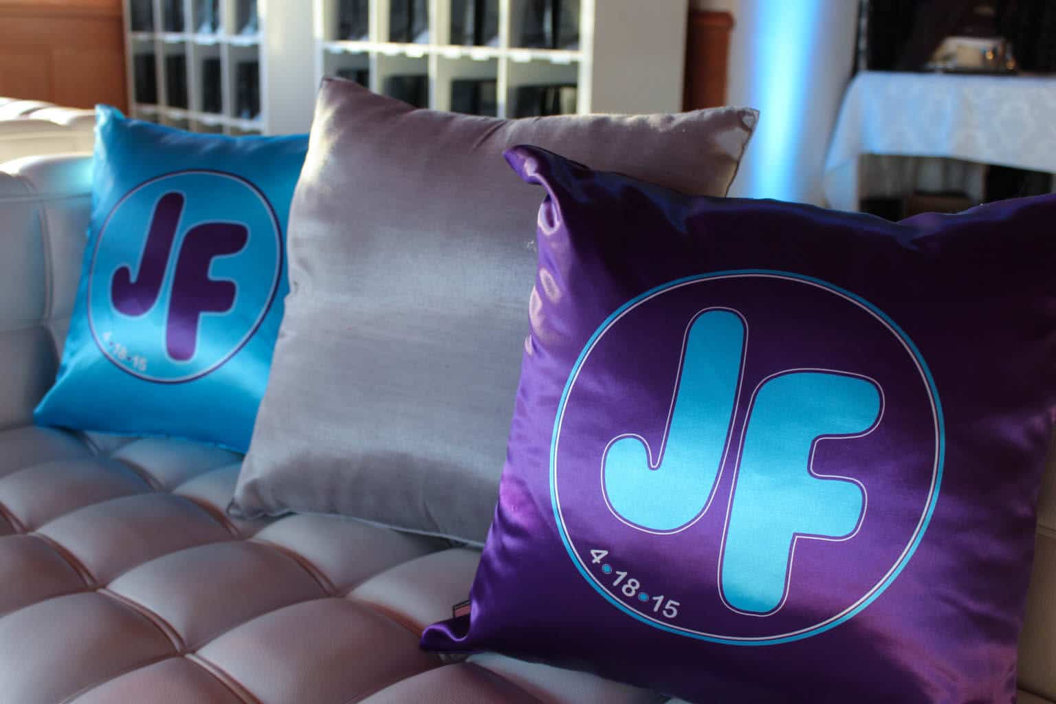 Purple and Turquoise Lounge Pillows with Custom Bat Mitzvah Logo