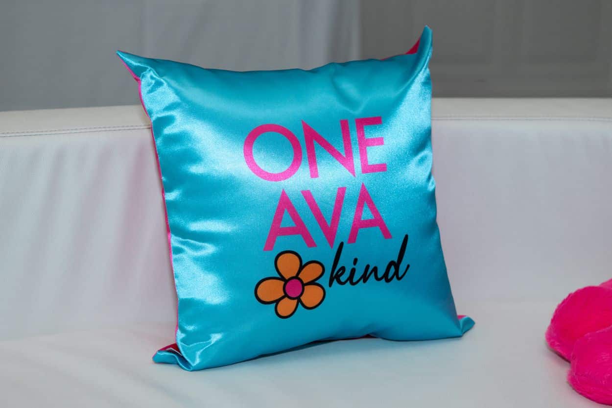 Custom Turquoise Logo Pillow for a Flower Theme Bat Mitzvah at Whippoorwill Country Club