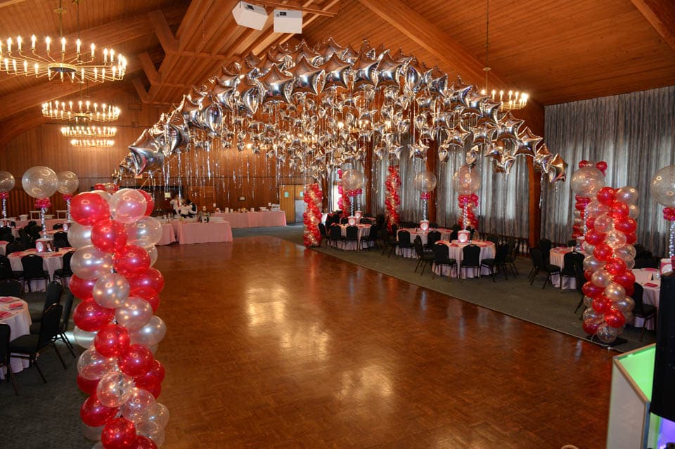 Hot Pink and Silver Balloon Canopy over Dance Floor with Lights