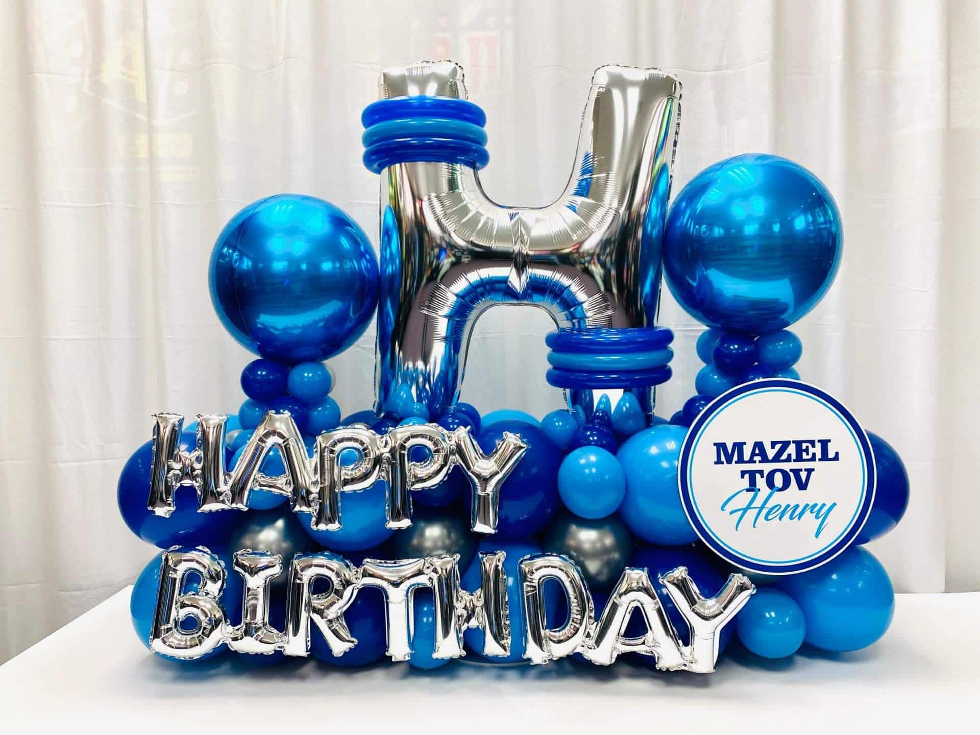 Shades of Blue Birthday Balloon Arrangement with Initial Letter and Custom Sign