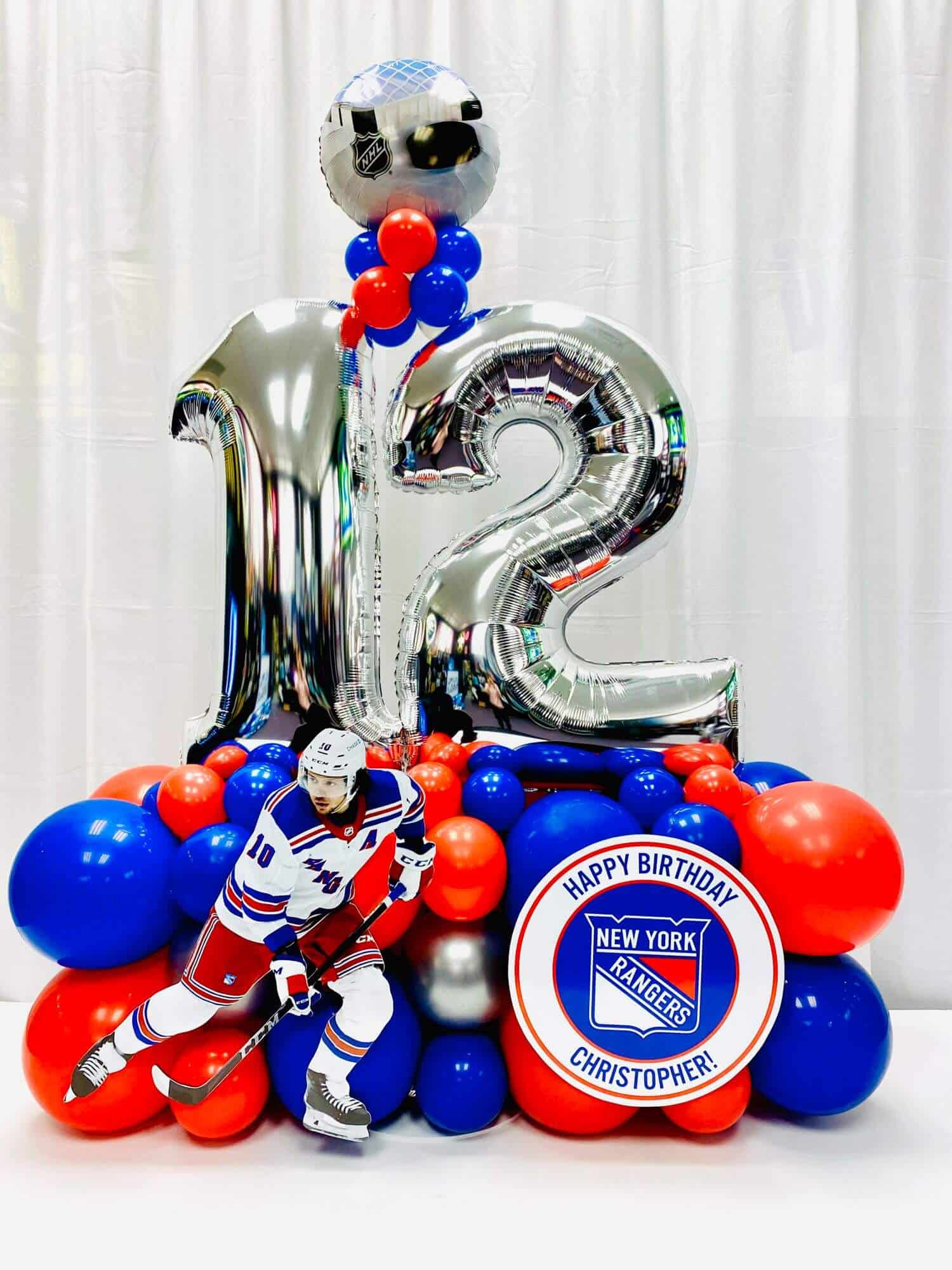 Hockey Themed Fancy Balloon Bouquet with Custom Cut Out and Sign for 12th Birthday