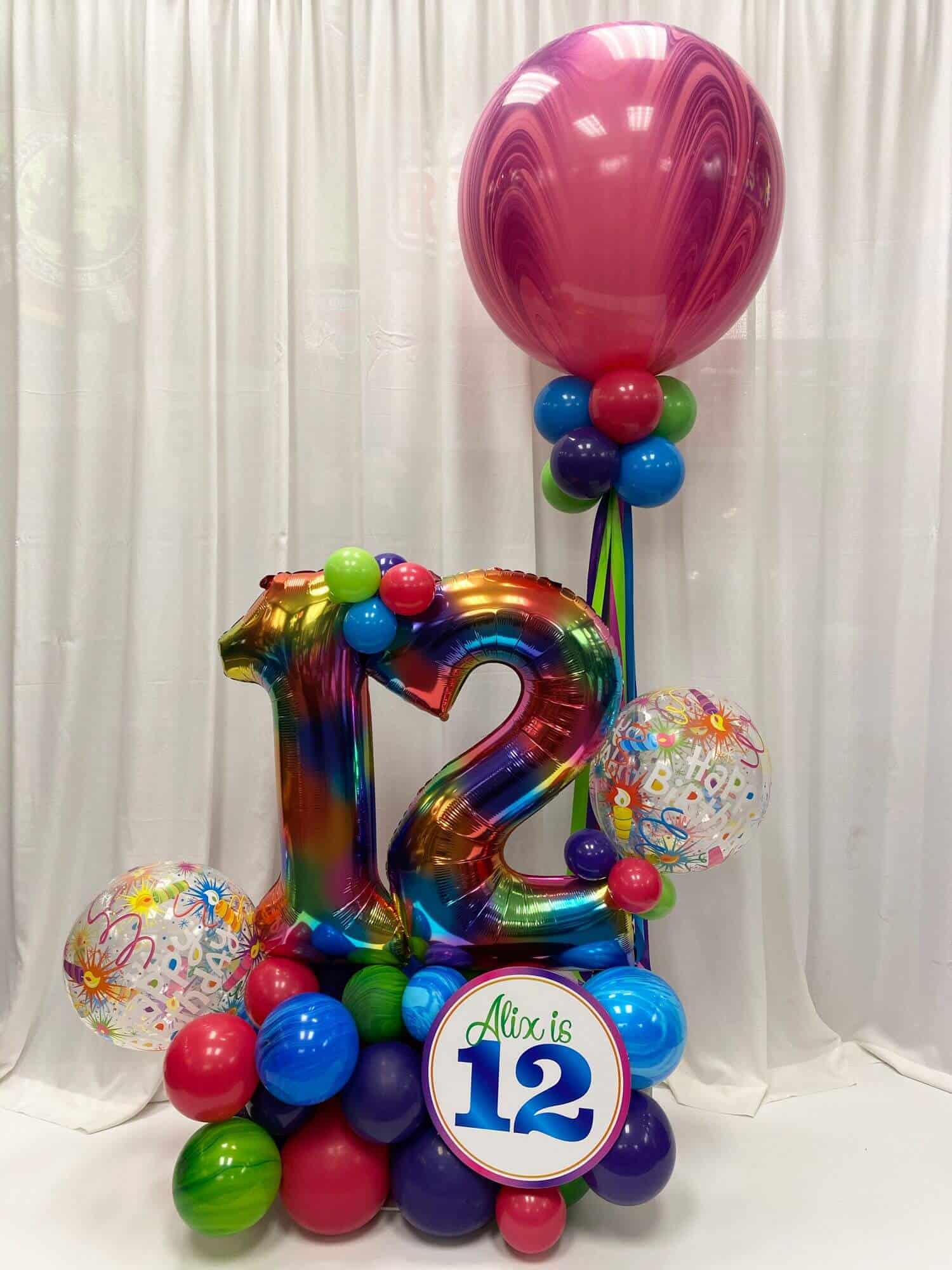 Tie Dye Balloon Bouquet with Bubble Balloons and Custom Sign