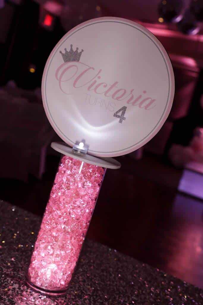 Princess Themed Logo Centerpiece with Light Pink Chips and Lights for 4th Birthday