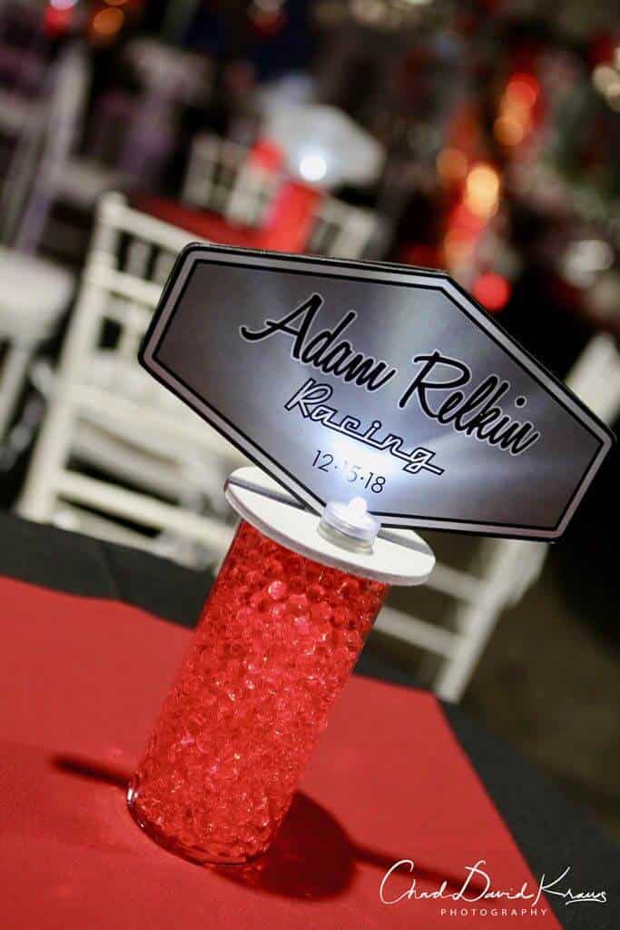 Racing Themed Centerpiece with Custom Logo for Car Themed Bar Mitzvah