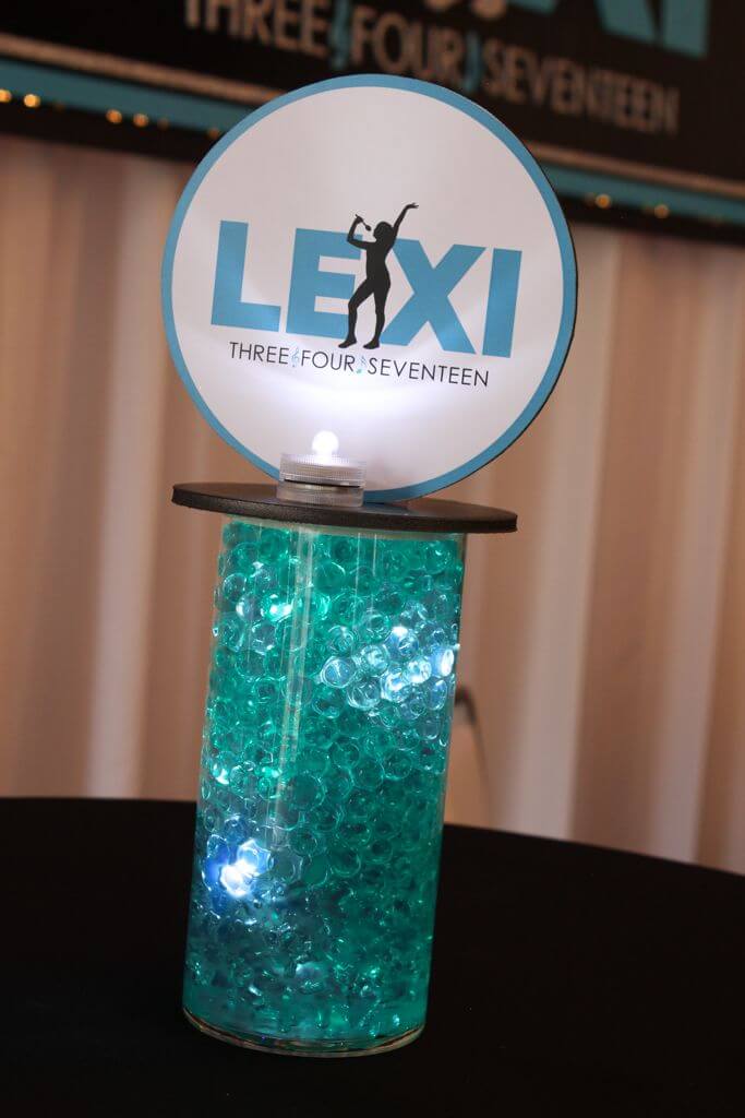 Music Themed Lounge Centerpiece with Aqua Gems and Logo