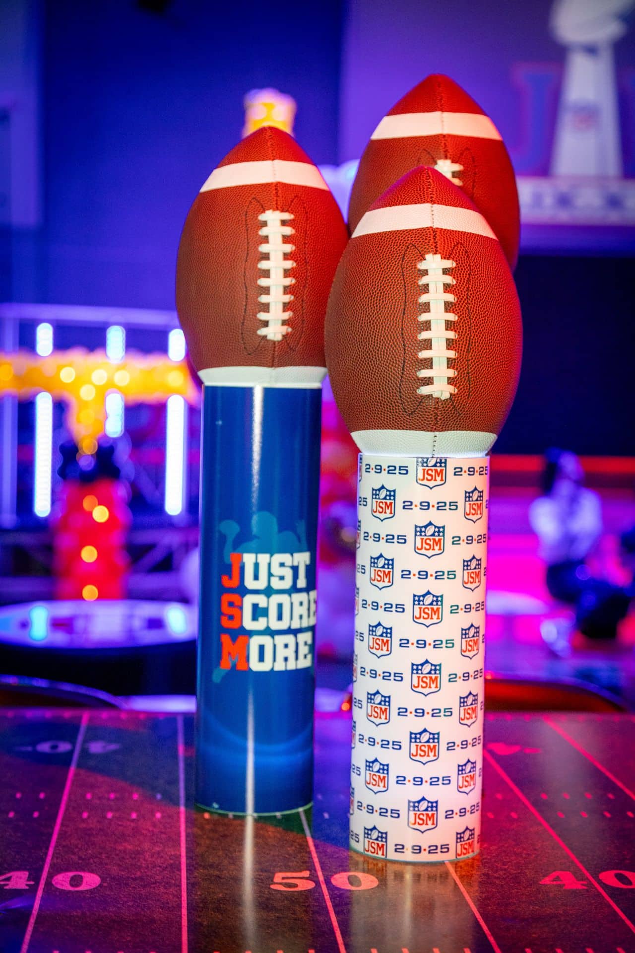 Football High Top Centerpiece with Logo Vases and Footballs