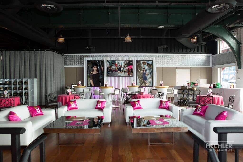 NYC Themed Bat Mitzvah Lounge Setup with Blowup Photos Background