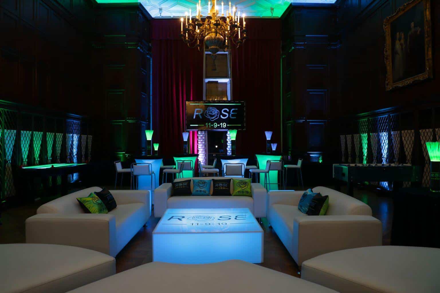 Neon Themed Bat Mitzvah Lounge with LED Furniture, Custom Pillows and Logo Backdrop at Reid Castle