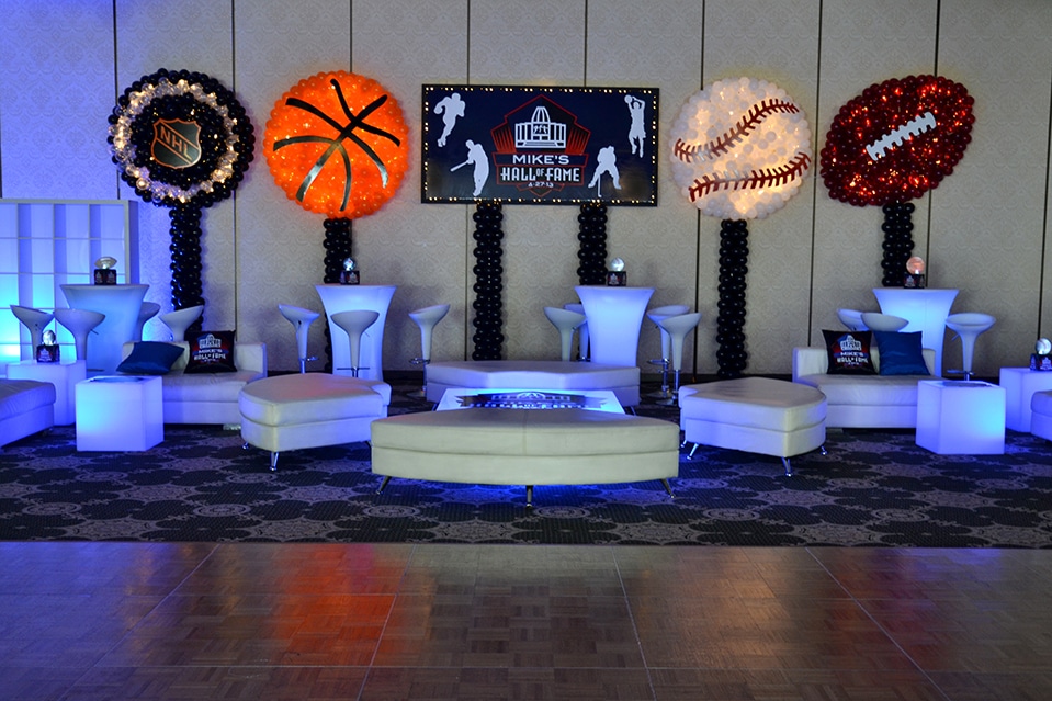 Sports Themed Lounge Decor with Custom Backdrop and Sports Ball Balloon Sculptures Background