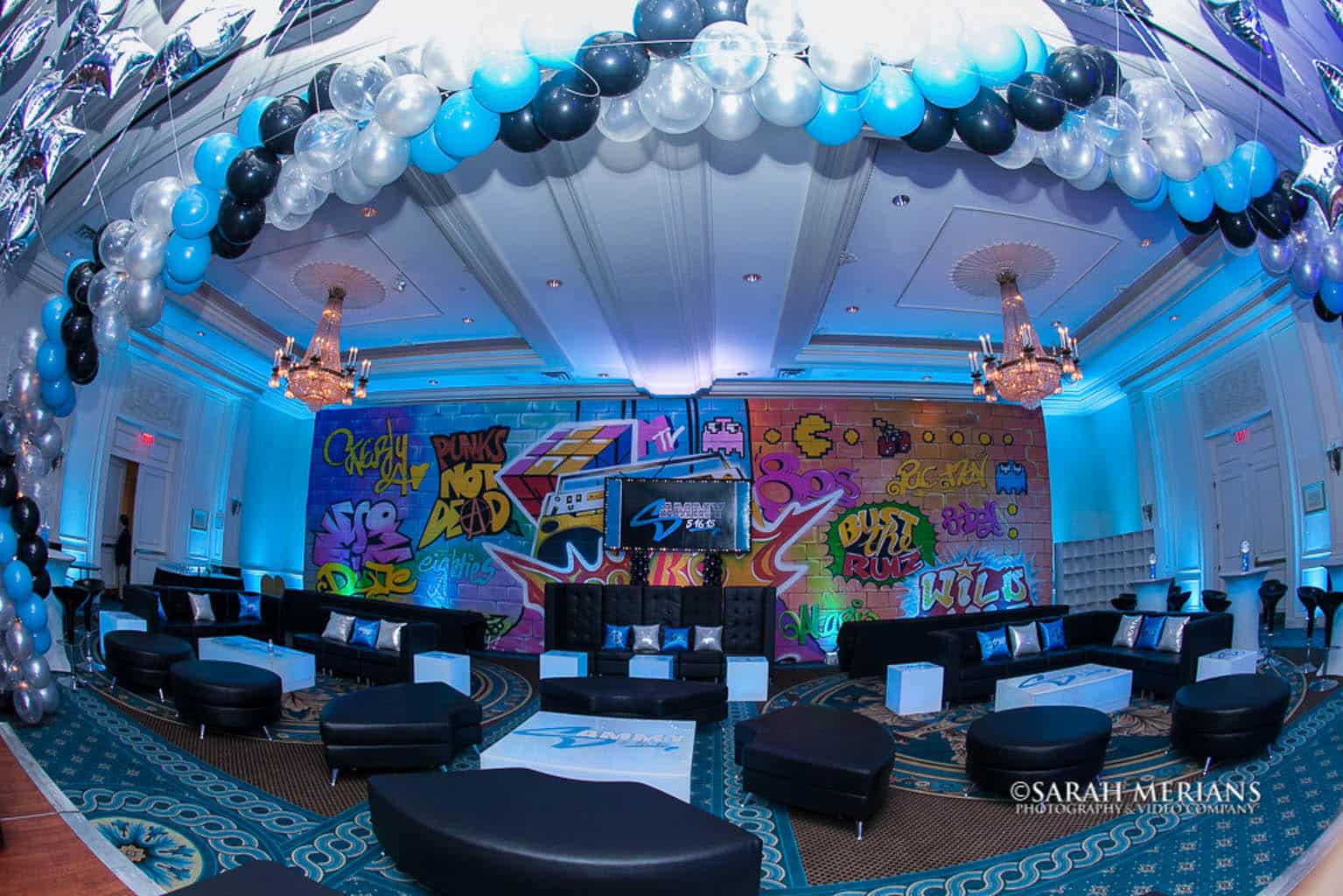 Graffiti Themed Bar Mitzvah Lounge with LED Furniture, Custom Logo Decals, Pillows, Graffiti Wall Mural and Logo Backdrop