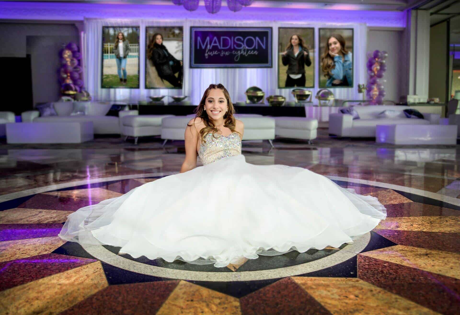 Bat Mitzvah Lounge Setup with Custom Logo Backdrop and Blowup Photos at Marina Del Ray, NY