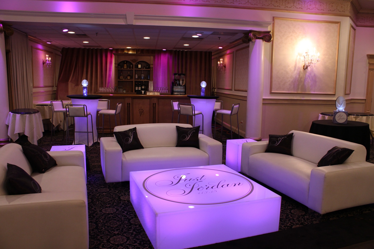 Purple Bat Mitzvah Lounge with Custom Pillows, LED Logo Tables, LED Hightops and Mini Centerpieces