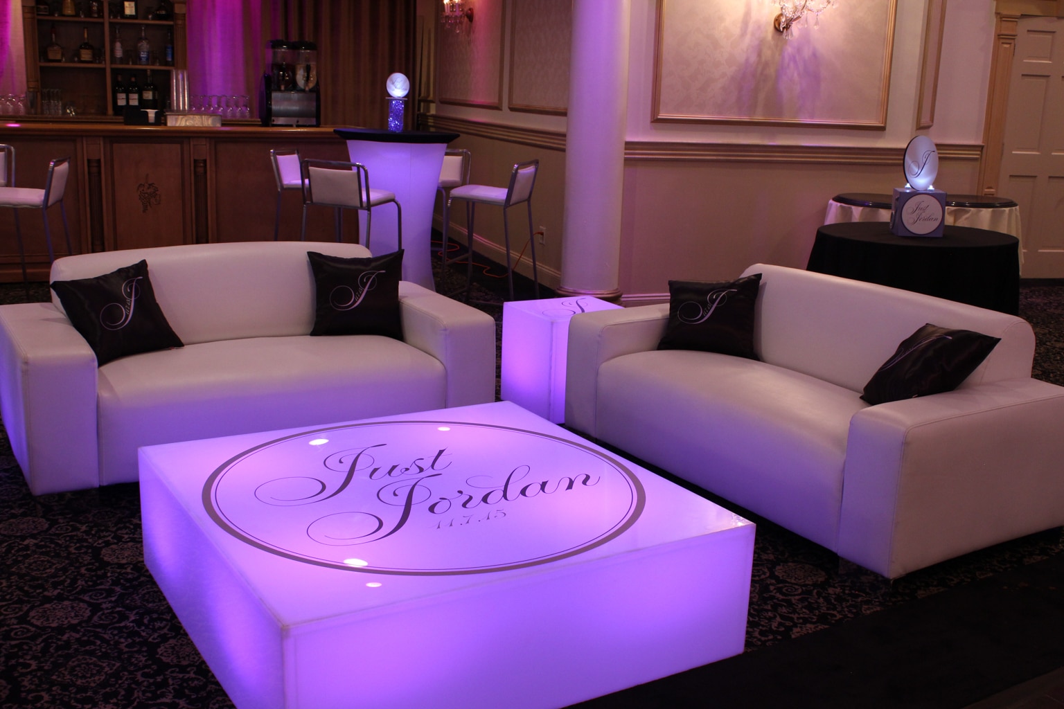 Purple Bat Mitzvah Lounge with Custom Pillows, LED Logo Tables, LED Hightops and Mini Centerpieces