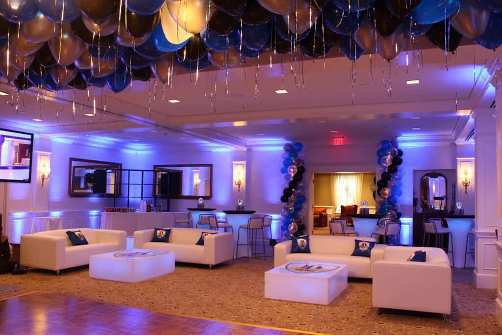 Ski Themed Bar Mitzvah Lounge with Custom Pillows, LED Tables with Logo Decal and Balloon Columns at Mt Kisco Country Club
