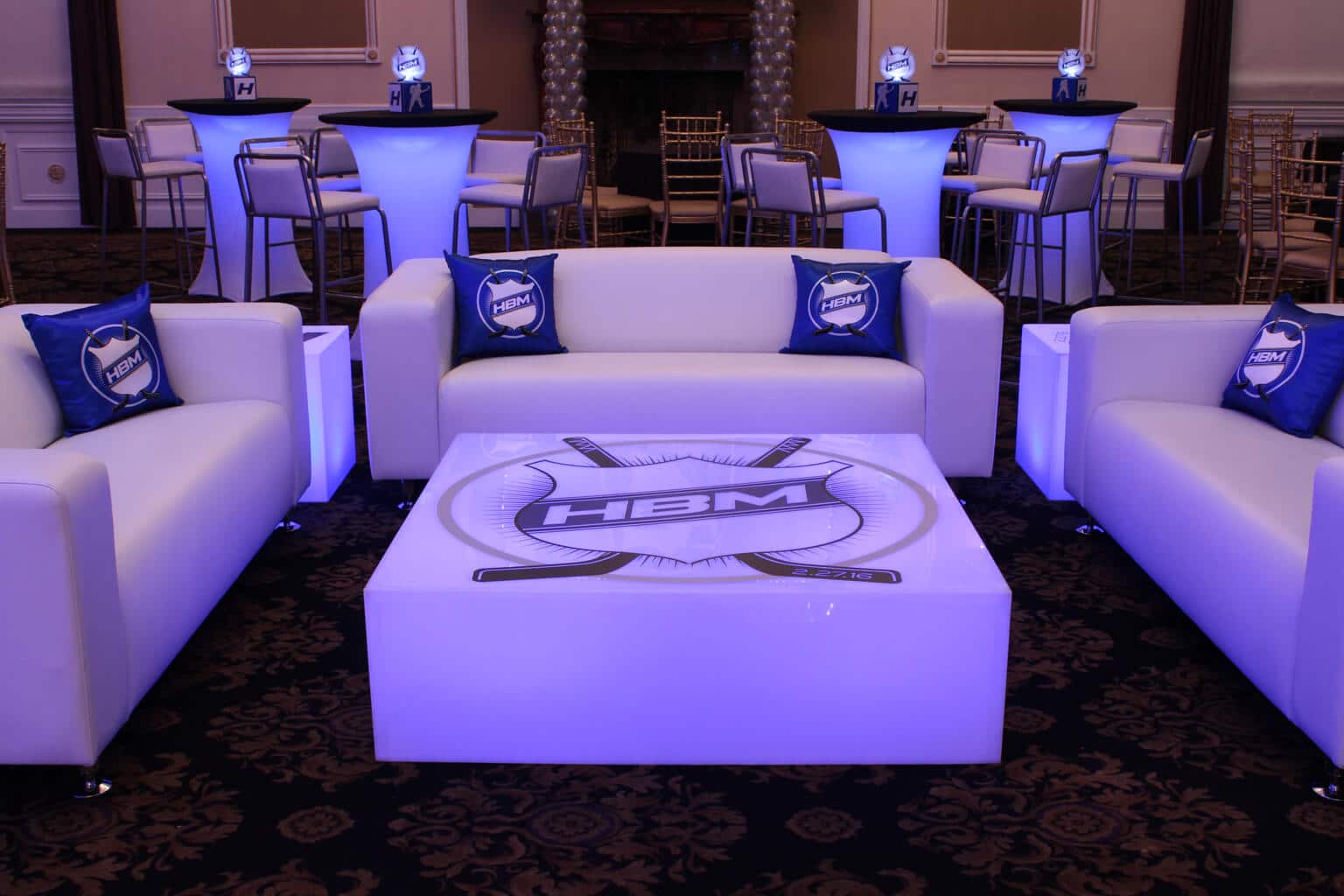 Hockey Themed Lounge with Custom Pillows, Logo Decals and LED Hightops at Florentine Gardens