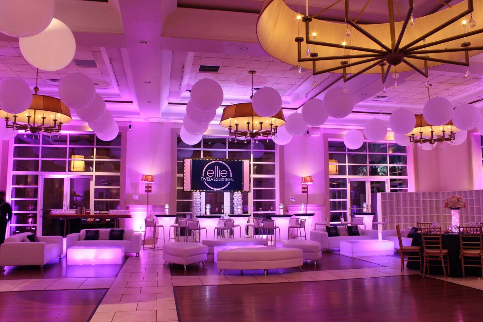 Bat Mitzvah Lounge Setup with LED Lighting, Custom Furniture and Logo Backdrop at Stonehouse at Stirling Ridge