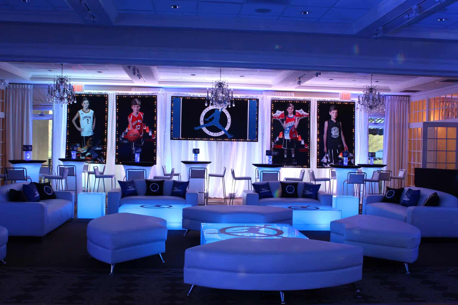 Lounge Setup with LED Backdrop, Blowup Photos, LED Furniture, Custom Pillows, Logo Decals and Mini Centerpieces for Sneaker Themed Bar Mitzvah