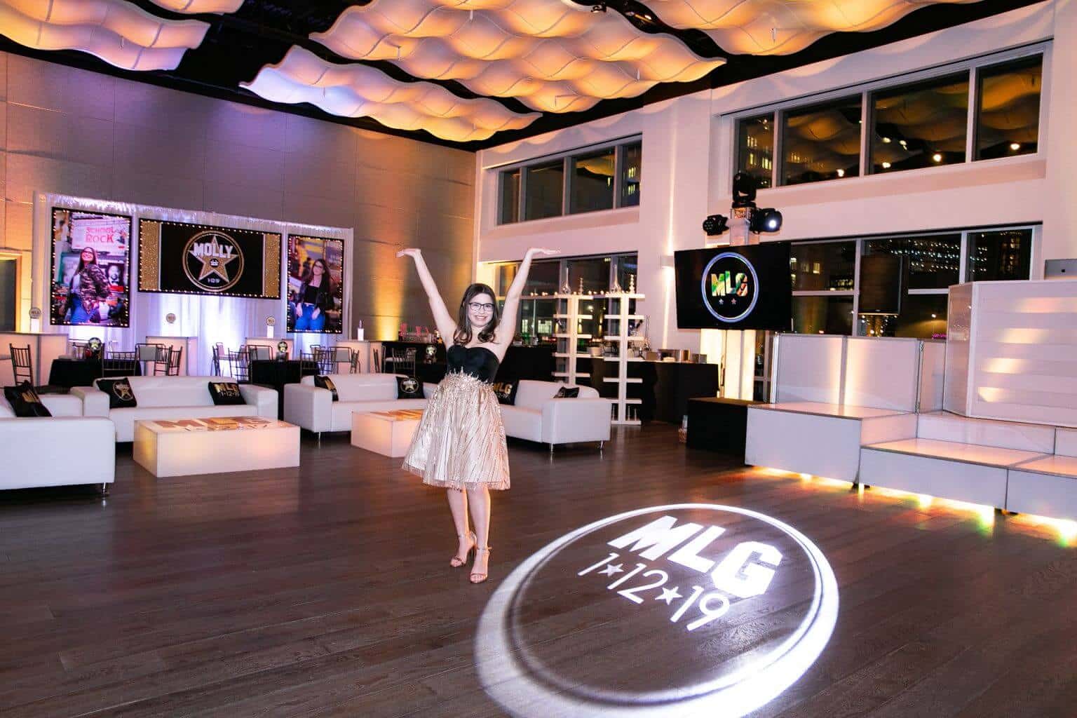 Hollywood Themed Lounge Setup with Custom Pillows and Logo Decals at Current, NYC