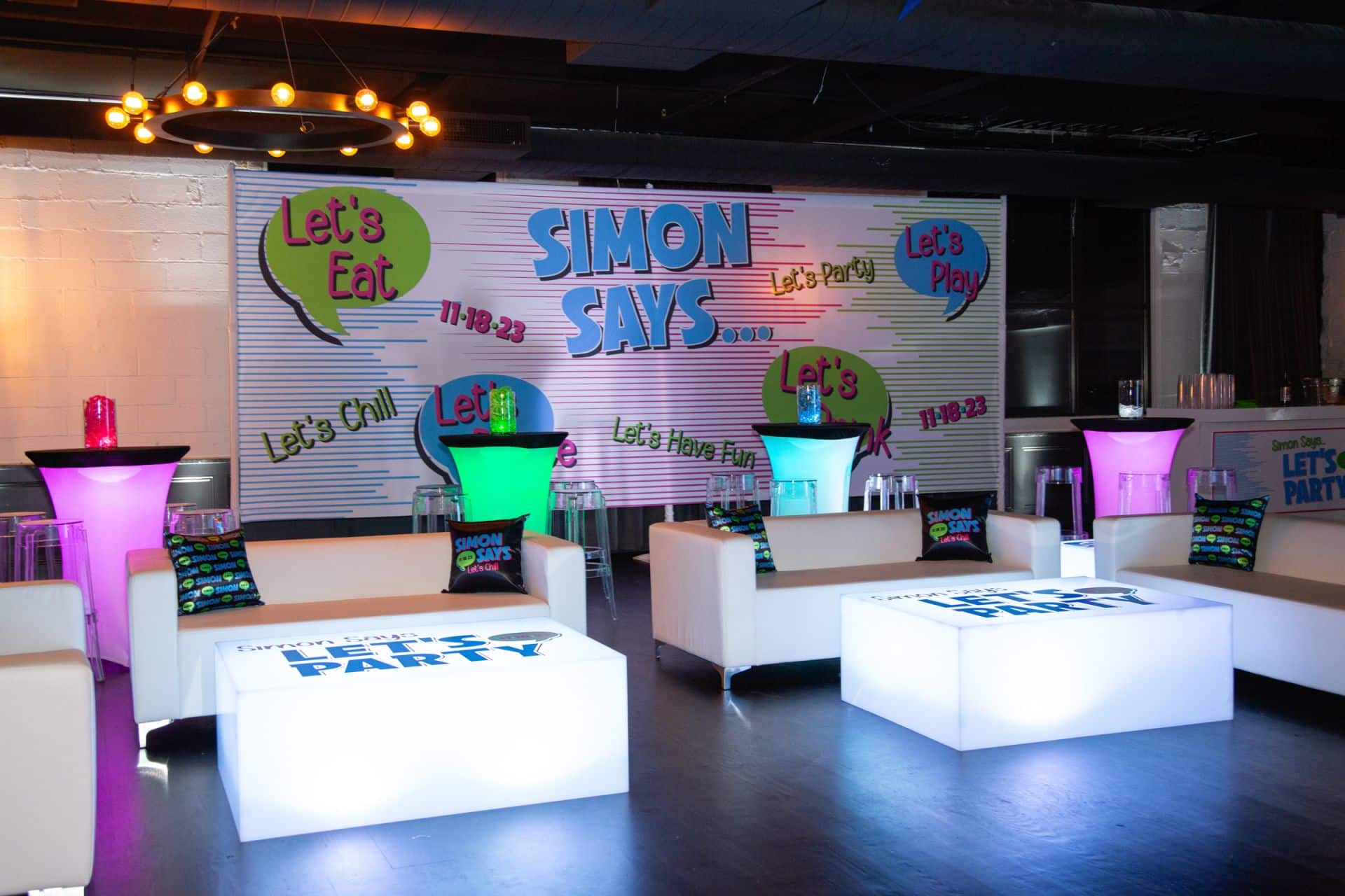Neon Themed Bar Mitzvah Lounge with Logo Tables and LED Highboys at Hudson Loft