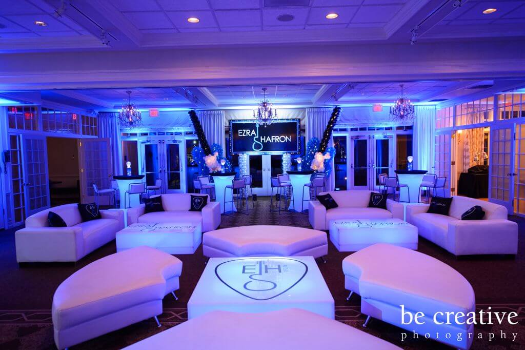 Music Themed Bar Mitzvah Lounge with Custom Logo Backdrop, Guitar Balloon Sculptures and LED Lighting