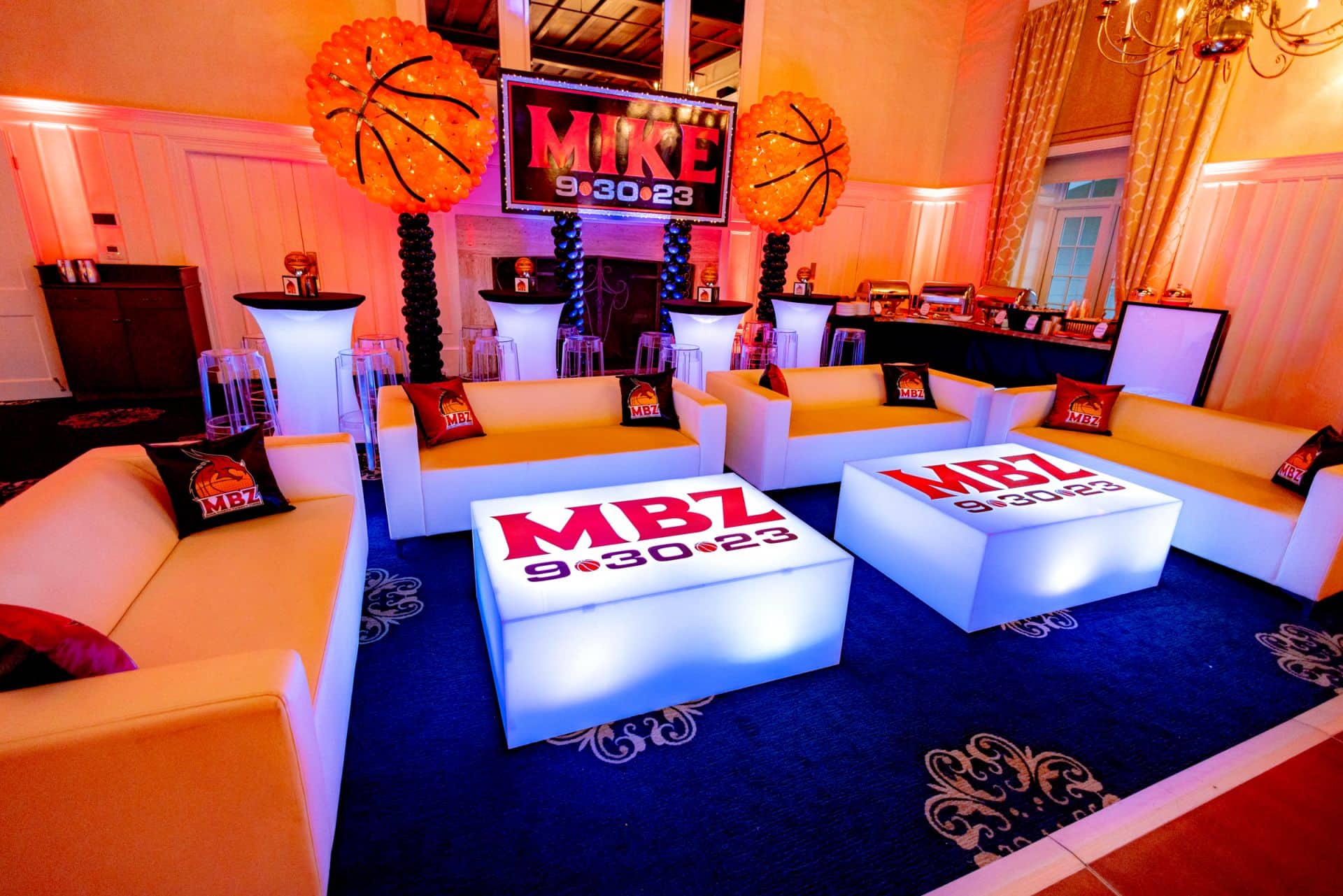 Basketball Themed Bar Mitzvah Lounge with Custom LED Tables, LED Highboys and Backdrop with Basketball Balloon Sculptures at Plainfield Country Club