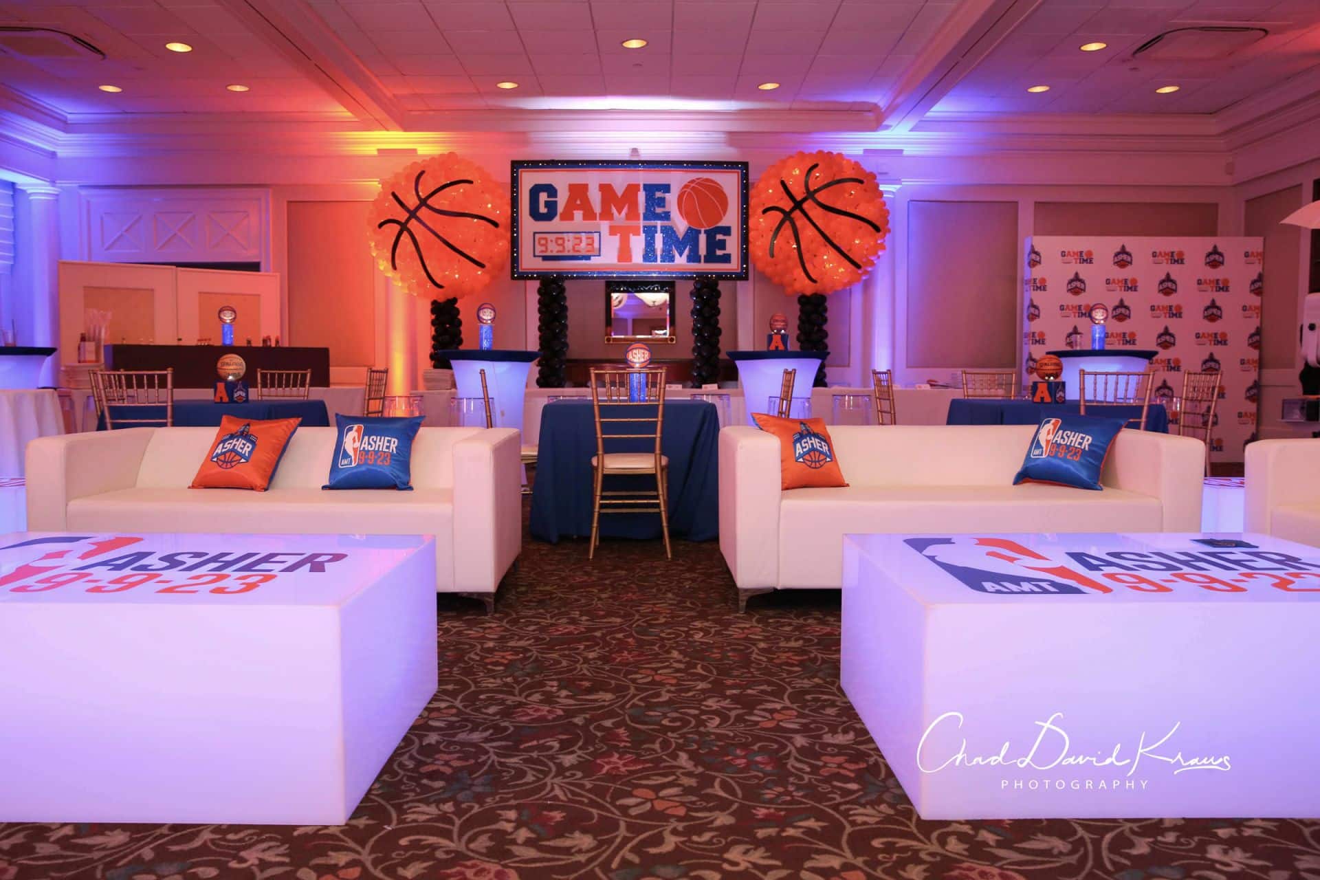 Basketball Themed Bar Mitzvah Lounge with Custom Logo Tables and Pillows at Hampshire Country Club