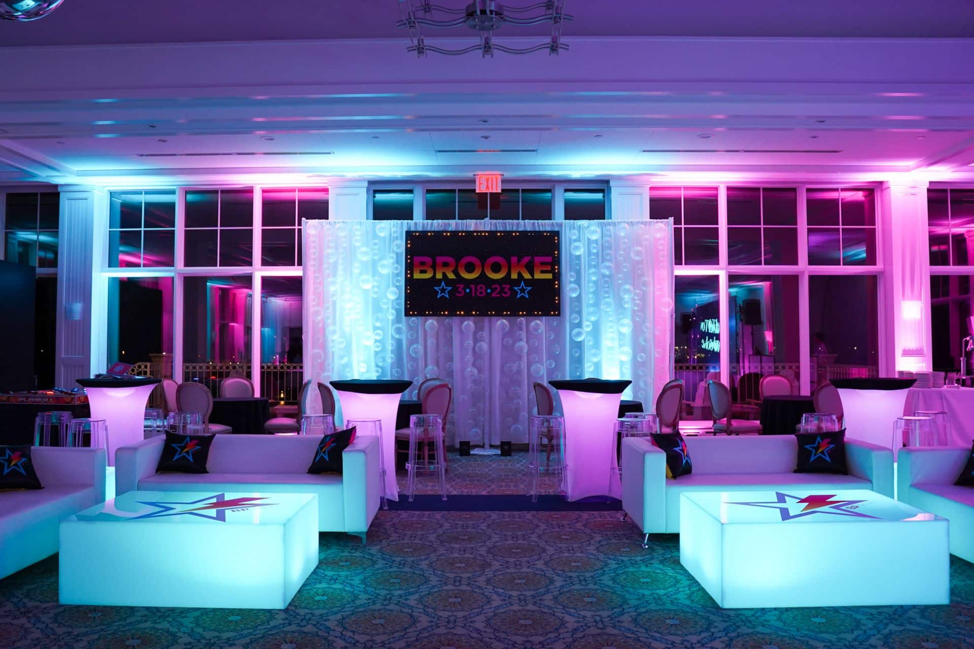 Custom Bat Mitzvah Lounge with LED Tables, High Tops, Custom Pillows, Custom Logo Backdrop and Balloon Bubble Wall at Beach Point Club