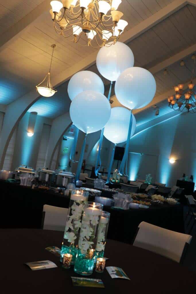 Teal LED Orchid Centerpiece with Floating Candles at Temple Beth Shalom