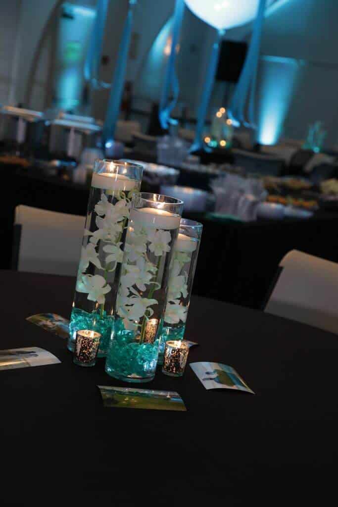 Teal LED Orchid Centerpiece with Floating Candles at Temple Beth Shalom