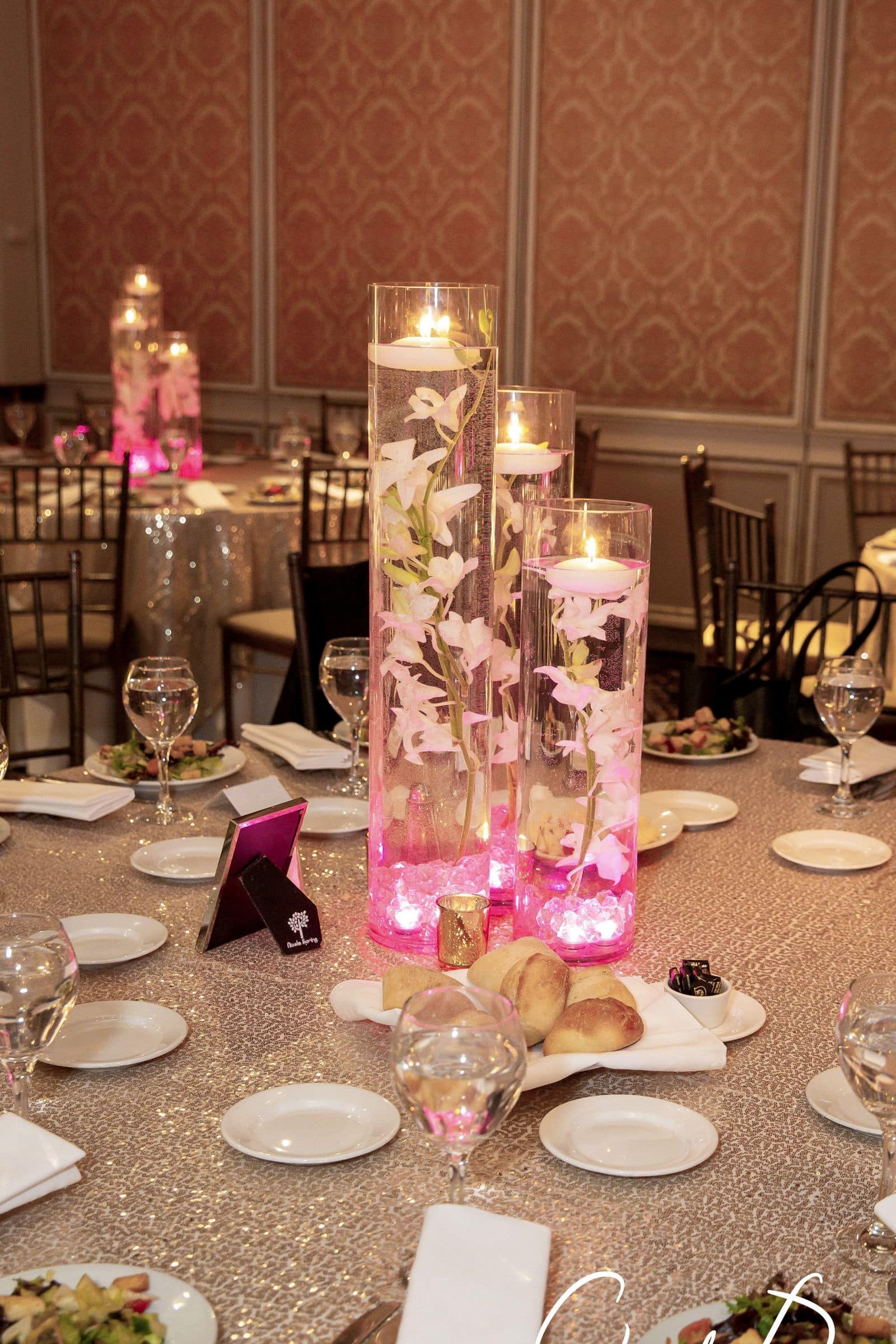 LED Orchid Centerpiece with Hot pink Chips and Gold Votives